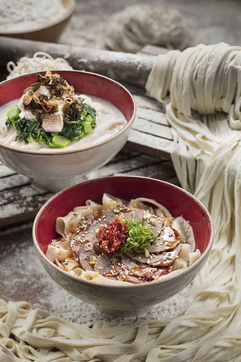 Stylized northern Chinese noodle and noodle making photograph.